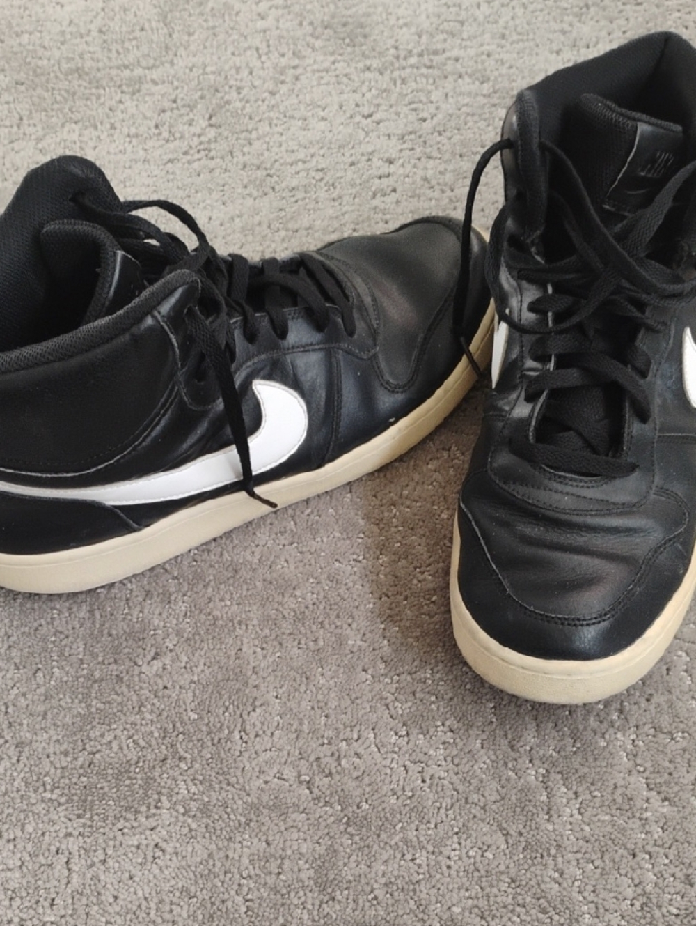 Nike Black High-Top Sneakers with White Swoosh and Cream Sole.  Men's 12